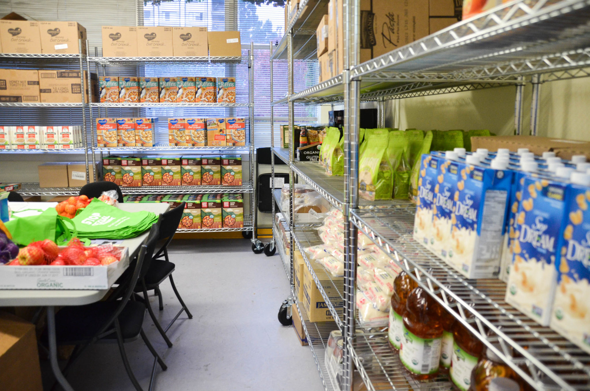Racks of food items stored at the UC Berkeley Food Pantry