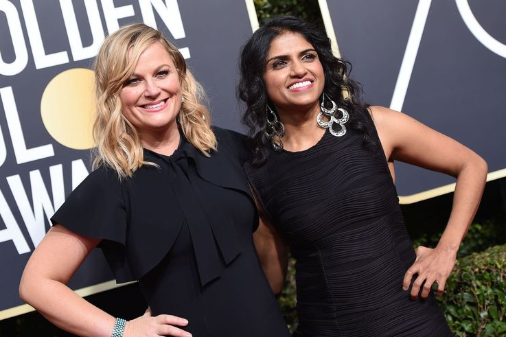 Saru Jayaraman (right) posing with Actor Amy Poehler (left) at the red carpet of the Golden Globes