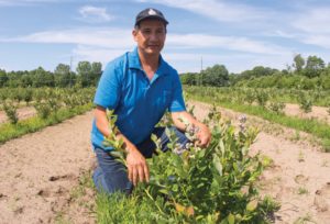 Photo of Farmer Nahum Avalos, part of a BFRDP-funded program to increase the sustainability of first and next generation Latino farmers in Michigan, led by Professor David Mota-Sanchez of Michigan State. Photo: David Mota-Sanchez.