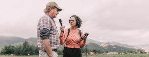 Reporter interviewing a farmer.