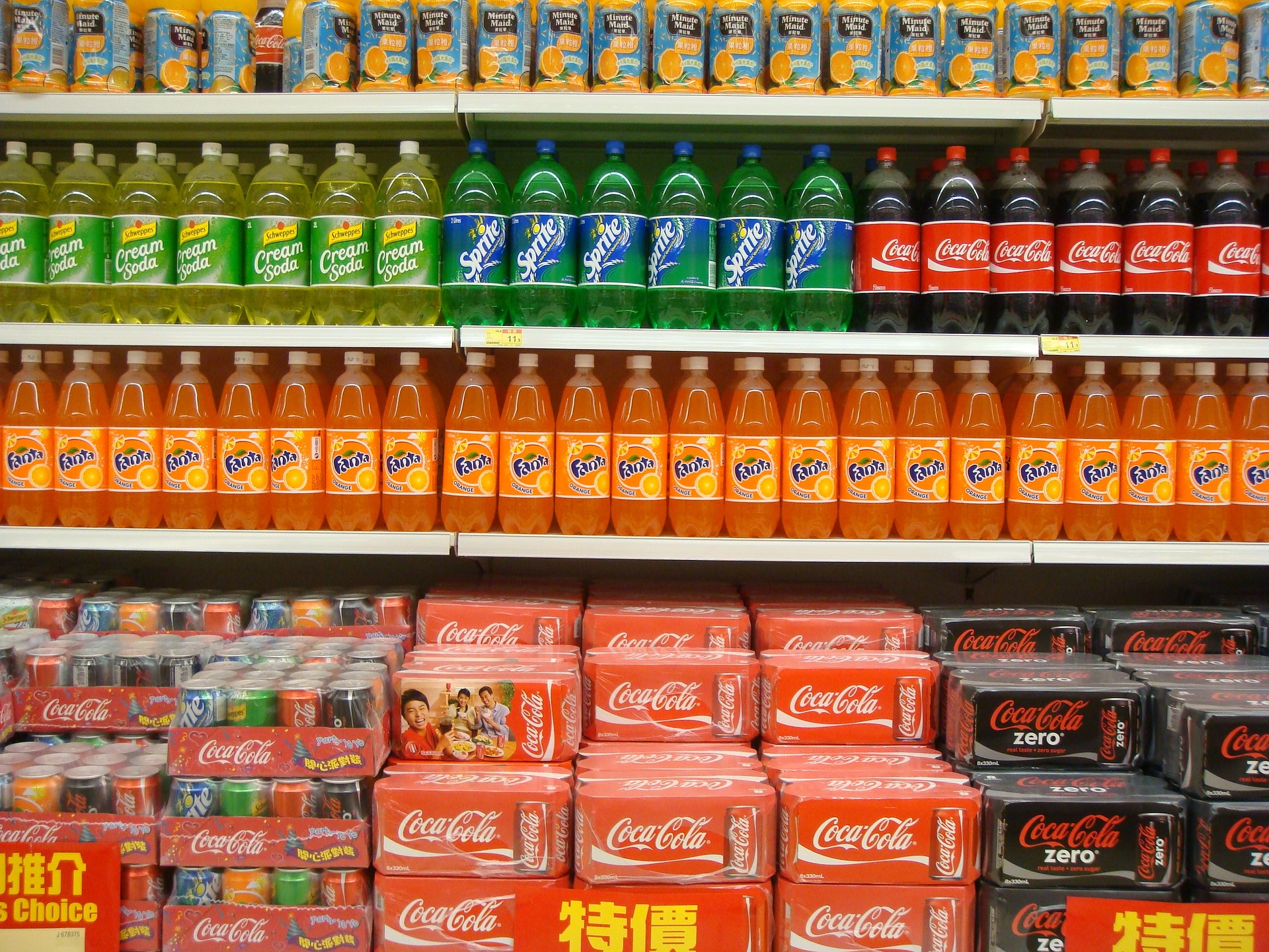 Soda on a shelf in a store.